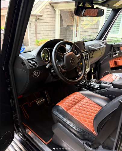 The same Mercedes G-Class driver interior after detailing, with cleaned surfaces and footwell