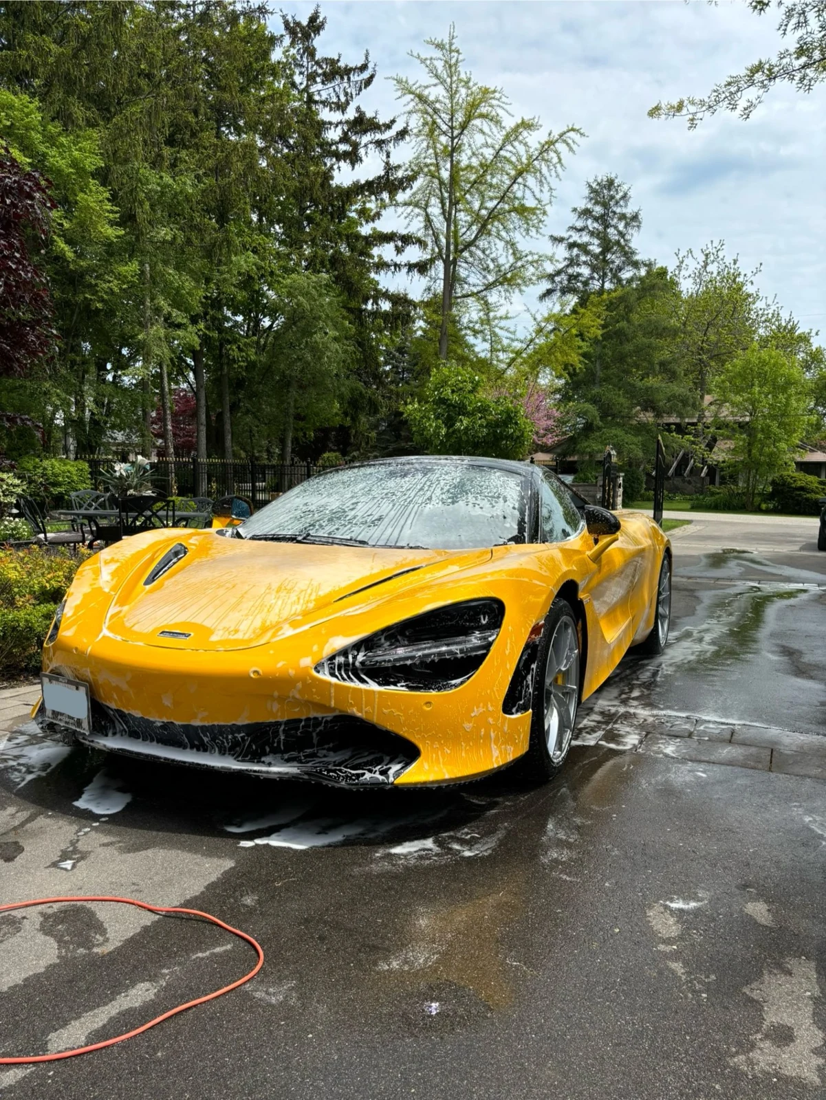 SimplyDriven hand washing a McLaren